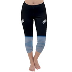 Astronaut Floating Above The Blue Planet Capri Winter Leggings  by Nexatart