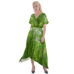 In The Forest The Fullness Of Spring, Green, Cross Front Sharkbite Hem Maxi Dress by MartinsMysteriousPhotographerShop