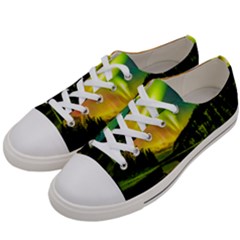 Scenic View Of Aurora Borealis Stretching Over A Lake At Night Men s Low Top Canvas Sneakers by danenraven