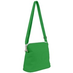 A Green Background With A White Border Zipper Messenger Bag