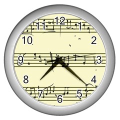 Music Notes On A Color Background Wall Clocks (silver)  by Nexatart